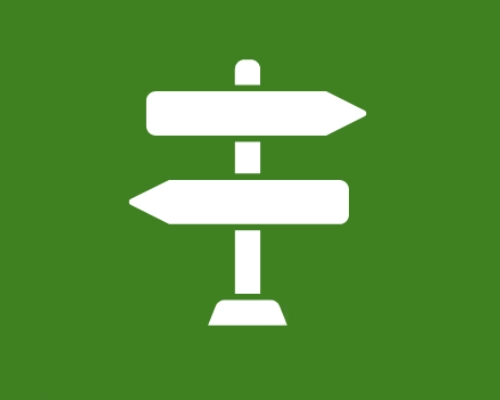 Imagen de Icono de poste con señales de dirección opuestas sobre fondo verde
